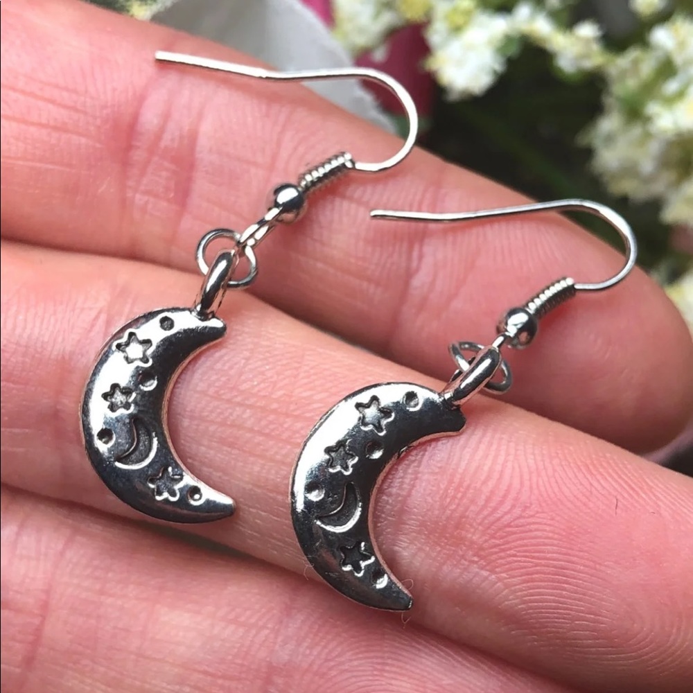 Handmade silver celestial moon and star earrings